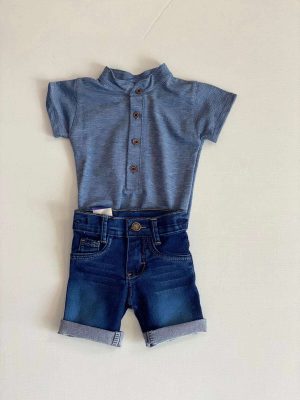 1095. Conjunto de camiseta azul con botones