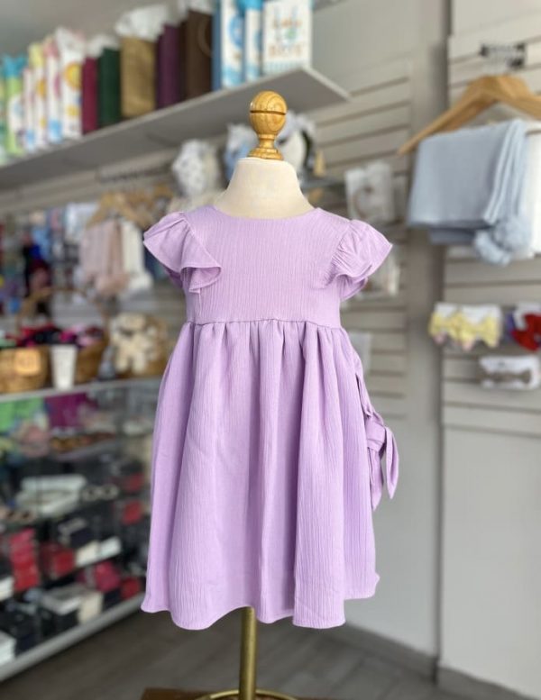 3353. Vestido morado con bandita de moño