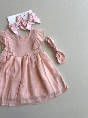 3355. Vestido rosa con detalle de manga y bandita