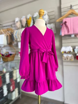 11169. Vestido fucsia con moño al frente