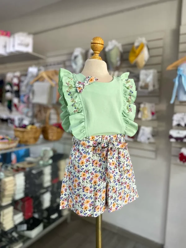 34102. Conjunto de blusita verde con detalle de moño