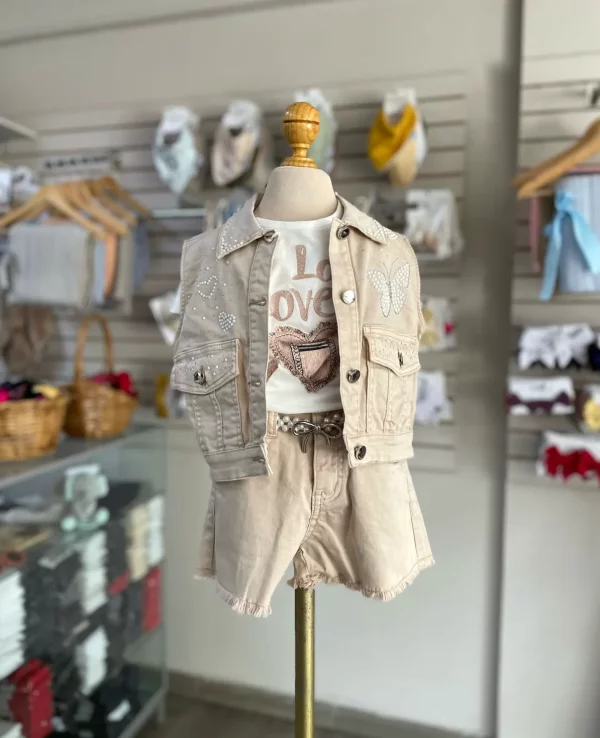 34106. Conjunto de chaleco y detalle de perlitas de nueva temporada