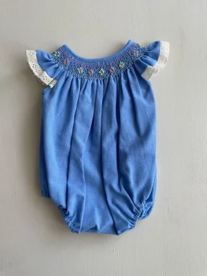 34127. Ranita azul con bordado smock