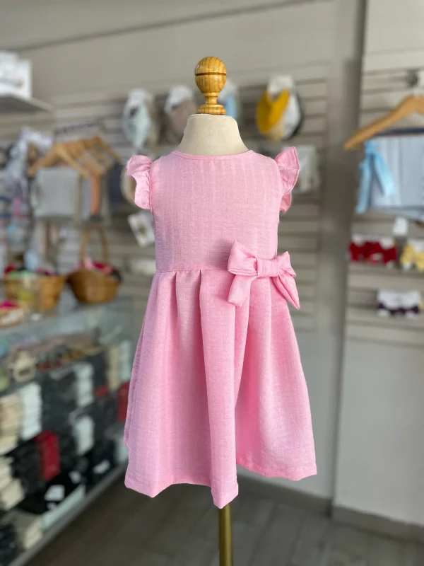 34136. Vestido rosita con moño al lado