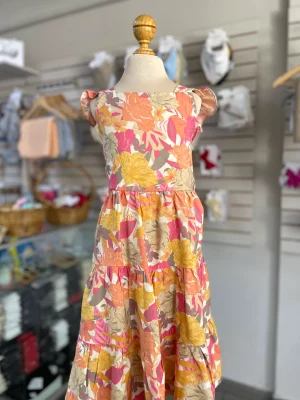 34181. Vestido floreado en tonos salmon