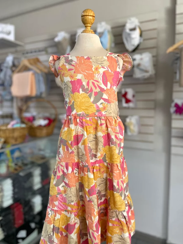 34181. Vestido floreado en tonos salmon