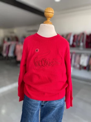 13084. Camiseta roja Lacoste