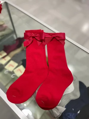 63121. Calcetas rojas de moño de liston