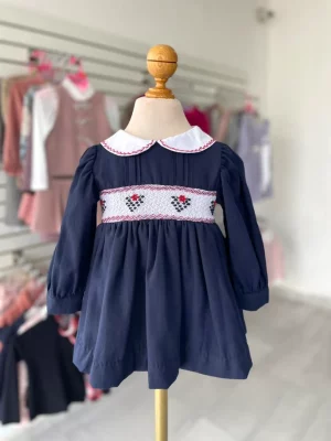 105. Vestido azul marino con cuellito blanco y bordado