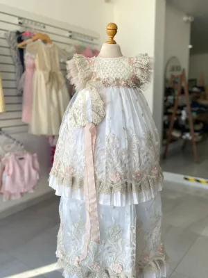 2007. Ropon desmontable con detalles en rosa y doble manguita