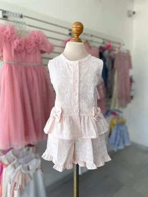 34279. Conjunto rosa de short y moñitos a los lados