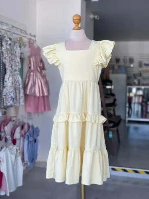 34333. Vestido amarillo con detalles de olan