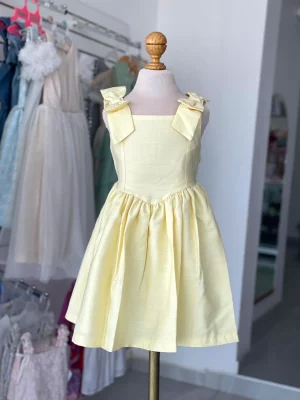 34349. Vestido con detalle de moñitos, el modelo mas pedido en color amarillo